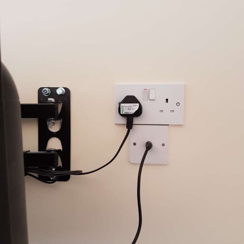 New double socket fitted beside a television bracket
