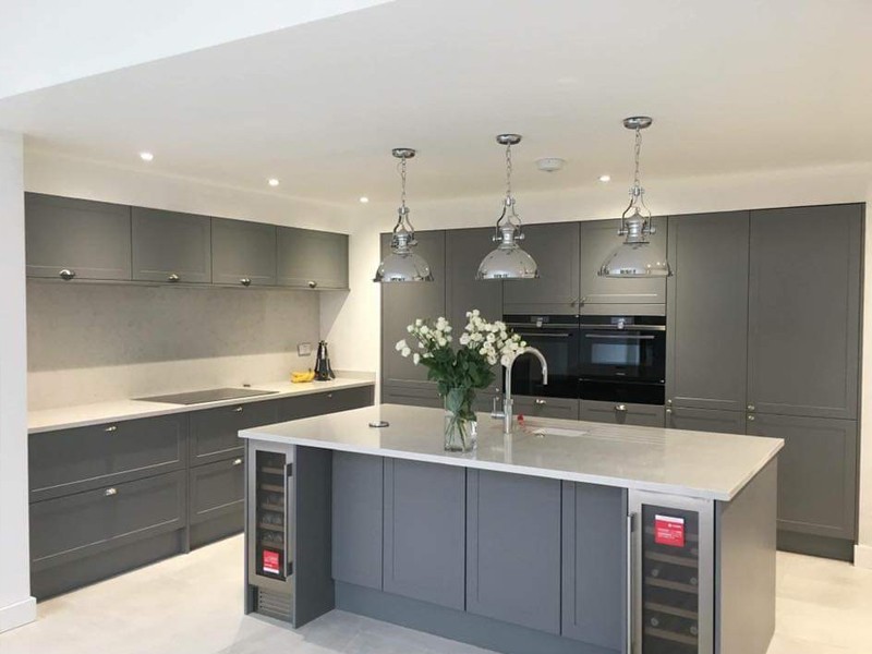 Finished fitted kitchen with worktops and lighting complete