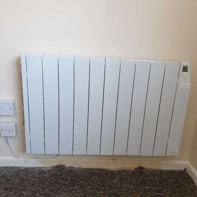 Rointe electric radiator installed on an interior wall